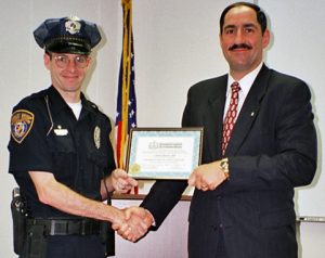 Officer-Receiving-His-CPO-Certificater-c